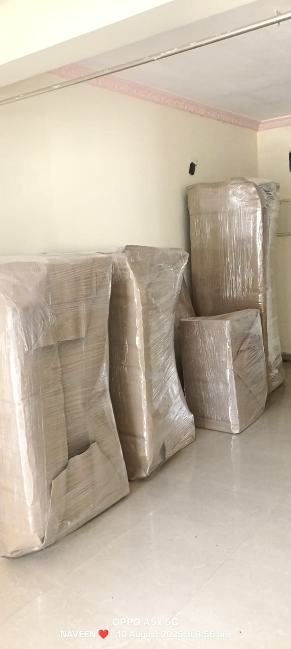 Heavy bubble wrap and stretch film packaging on wooden living room furniture