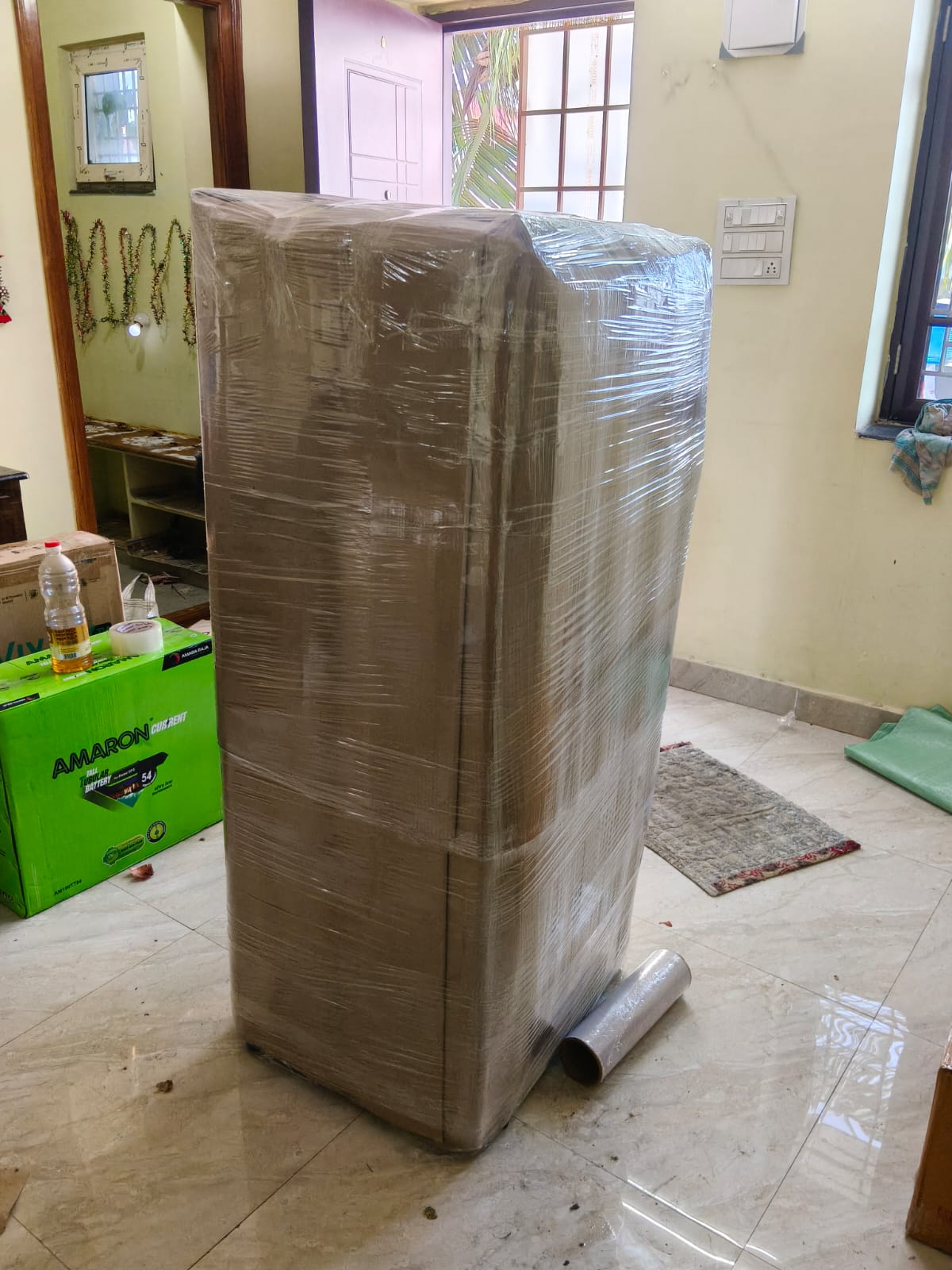 Motorcycle wrapped with corrugated sheets and protective bubble layer